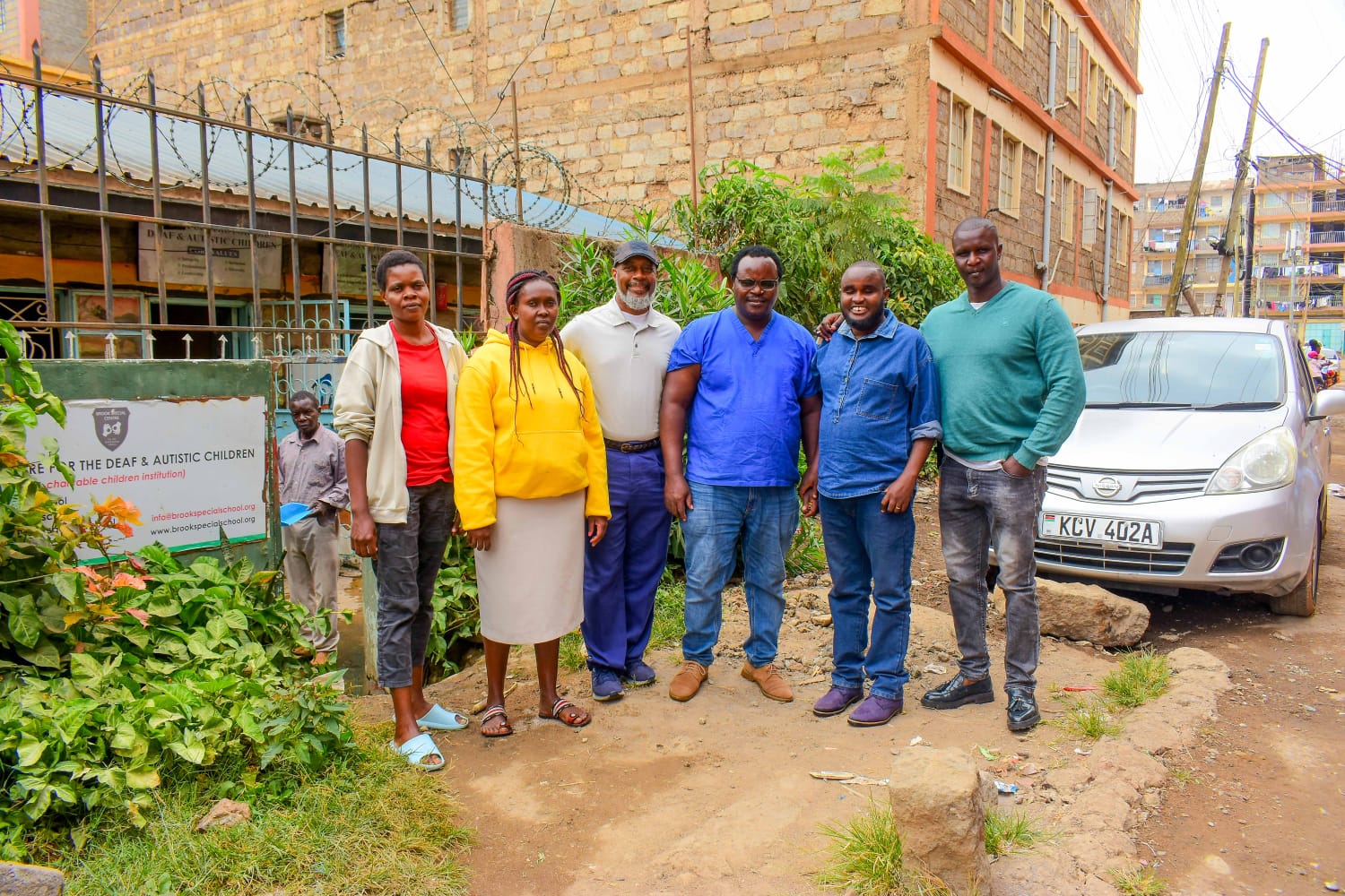 Community partners visiting a school that supports deaf and autistic children