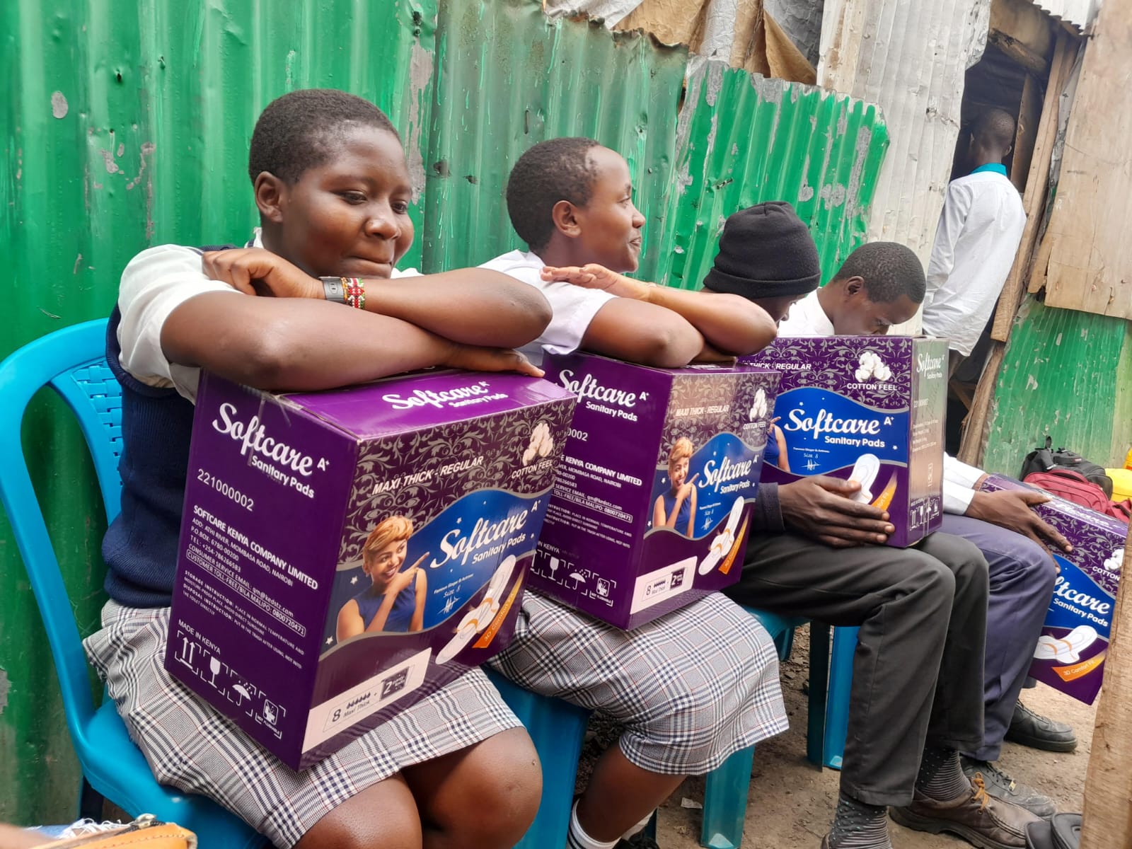 Schoolgirls receiving menstrual dignity supplies